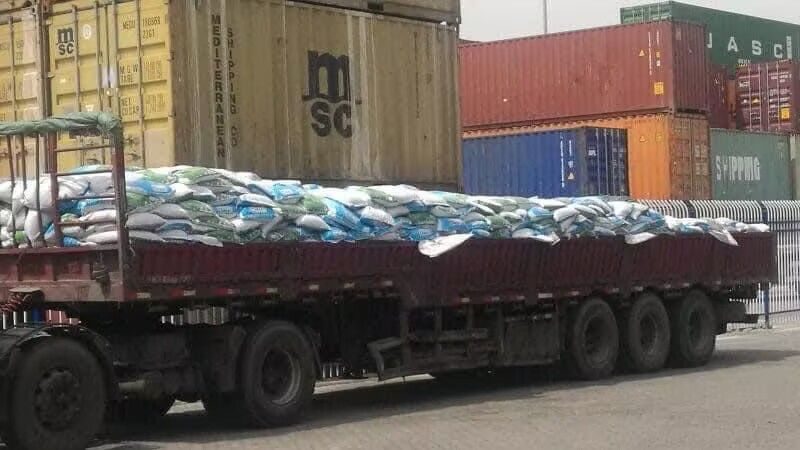 DCP 18% powder bags delivered to port for container loading
